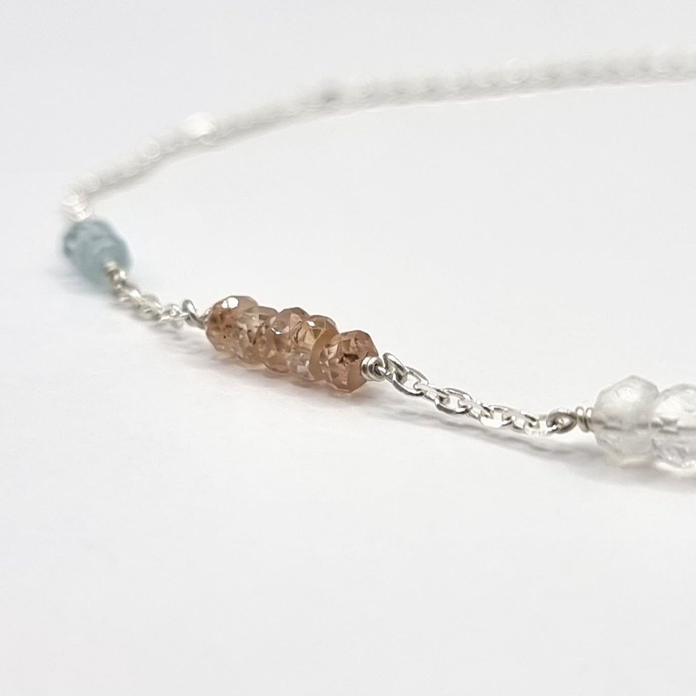 aquamarine, zircon and moonstone sterling silver chain necklace zircon detail