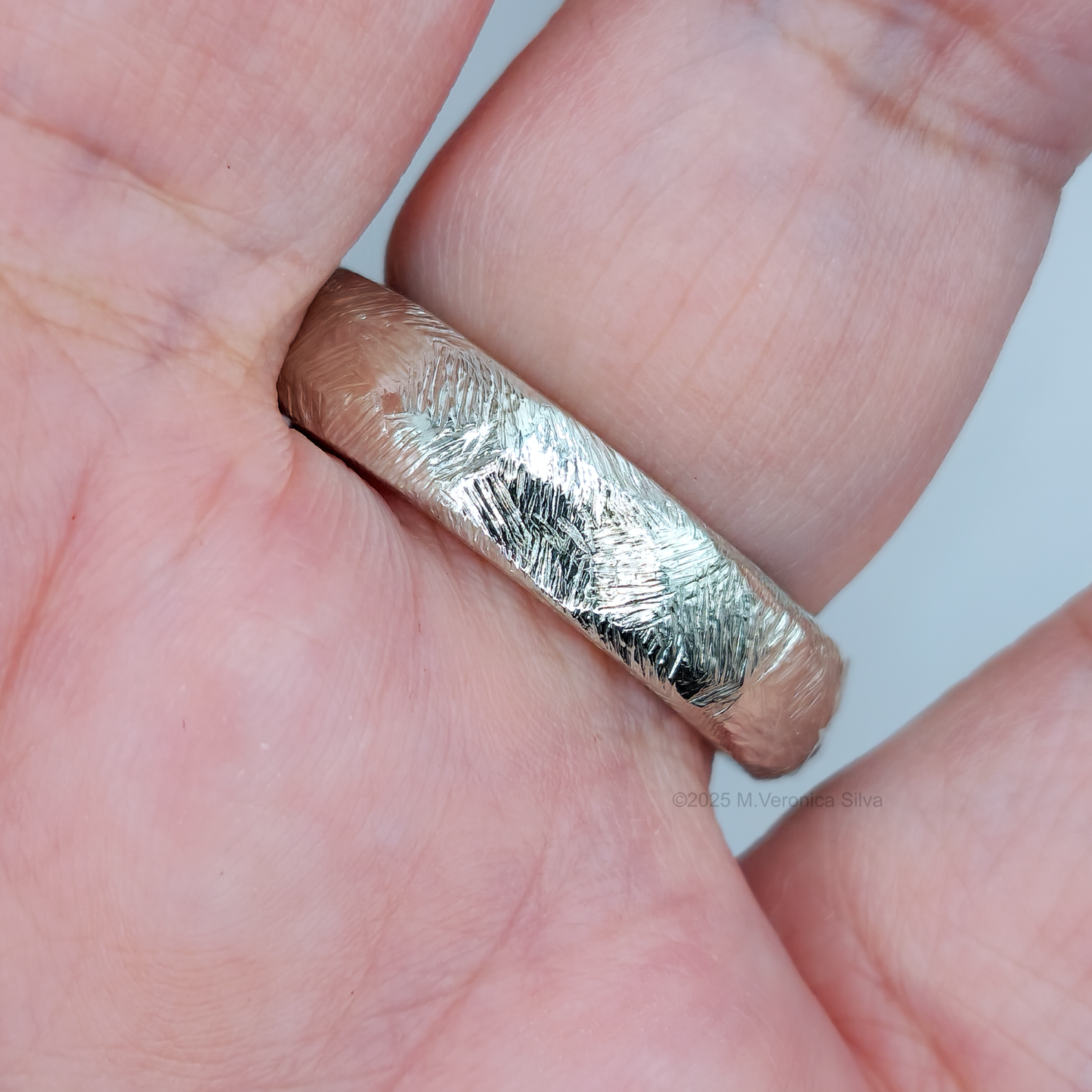 Unconformity silver statement ring, band texture detail