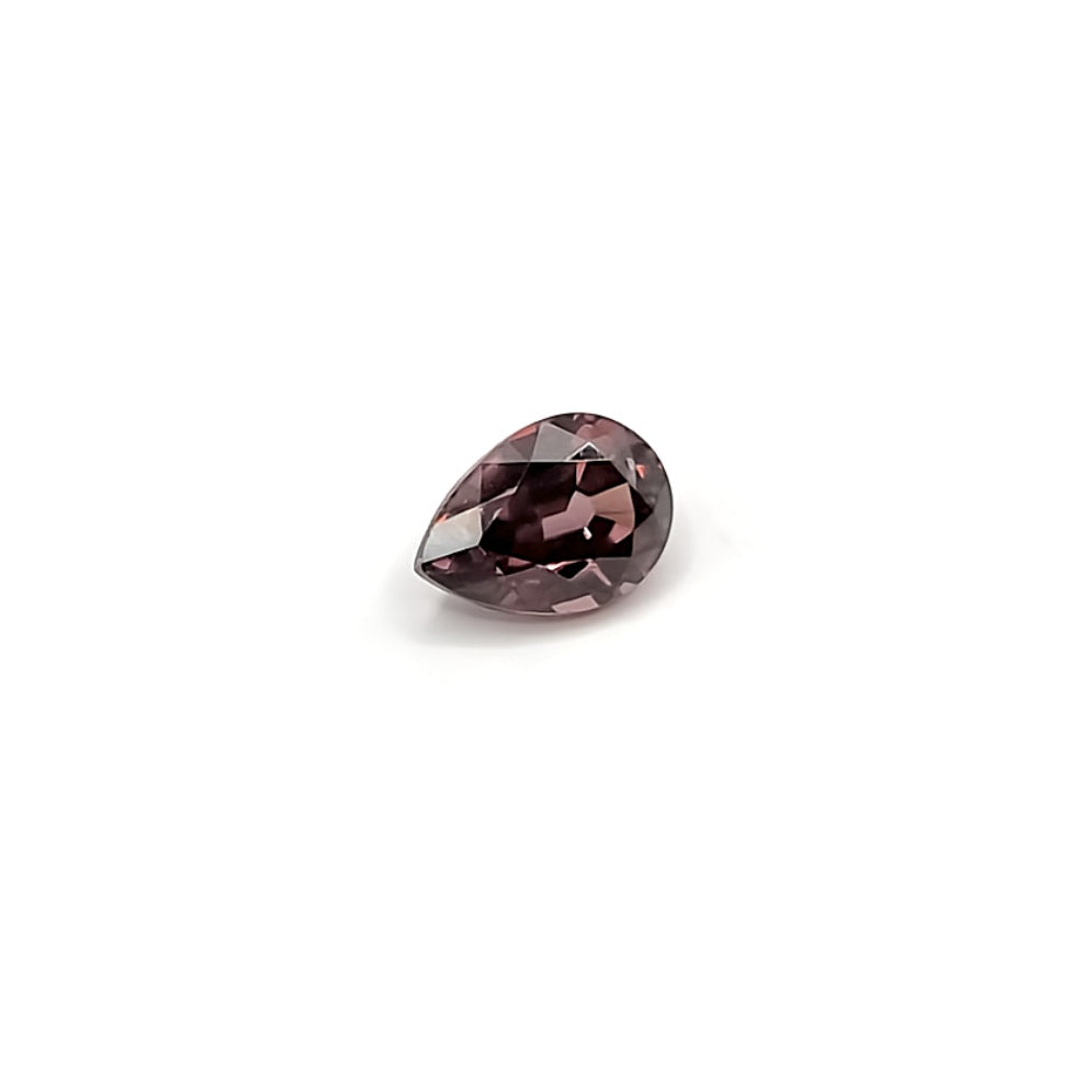 1.18ct Pear Cut Purple-Red Zircon