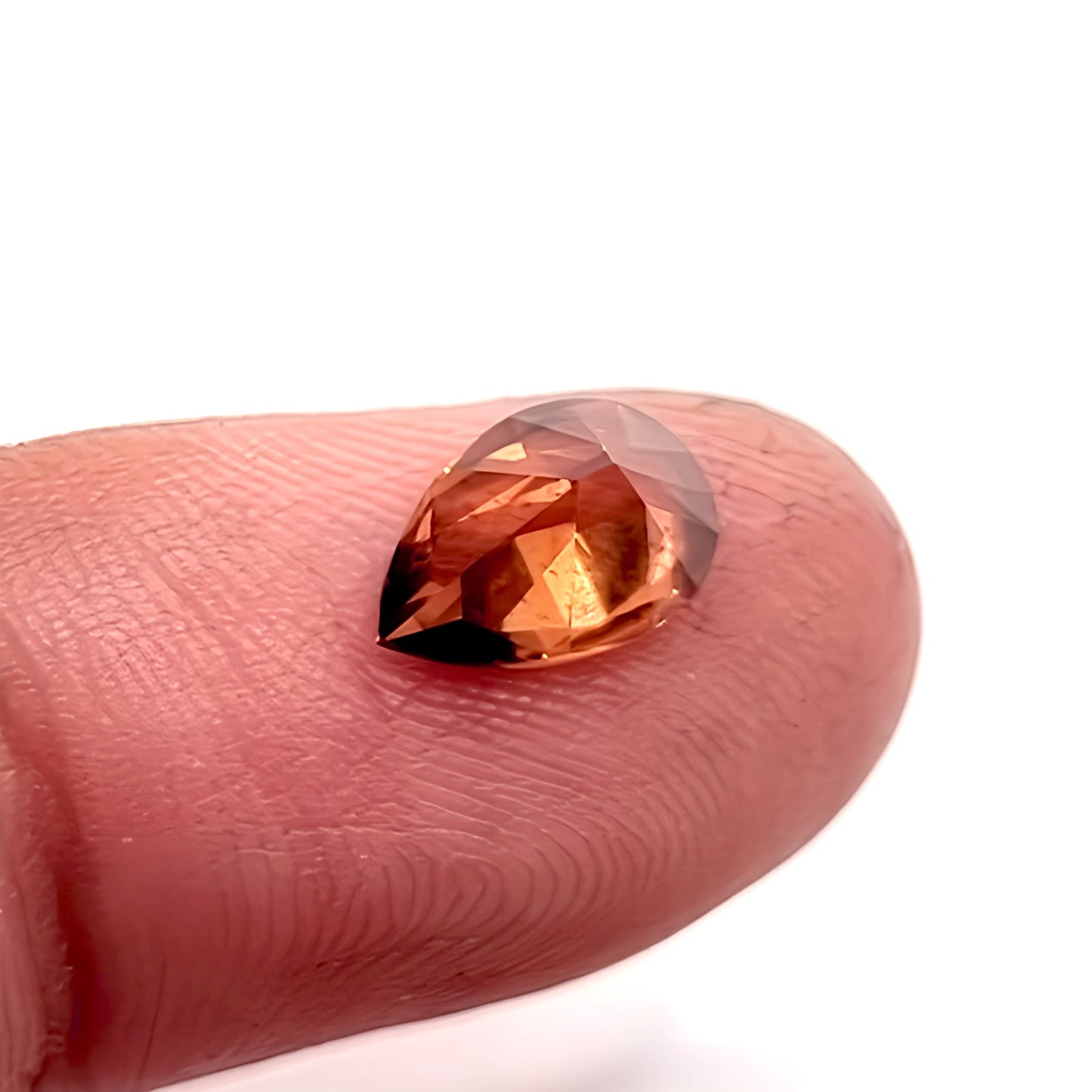 2.34ct Pear Cut Firey Red Zircon