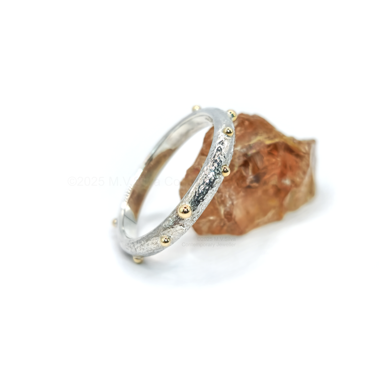 "Satellites" reticulated wedding ring with gold accents