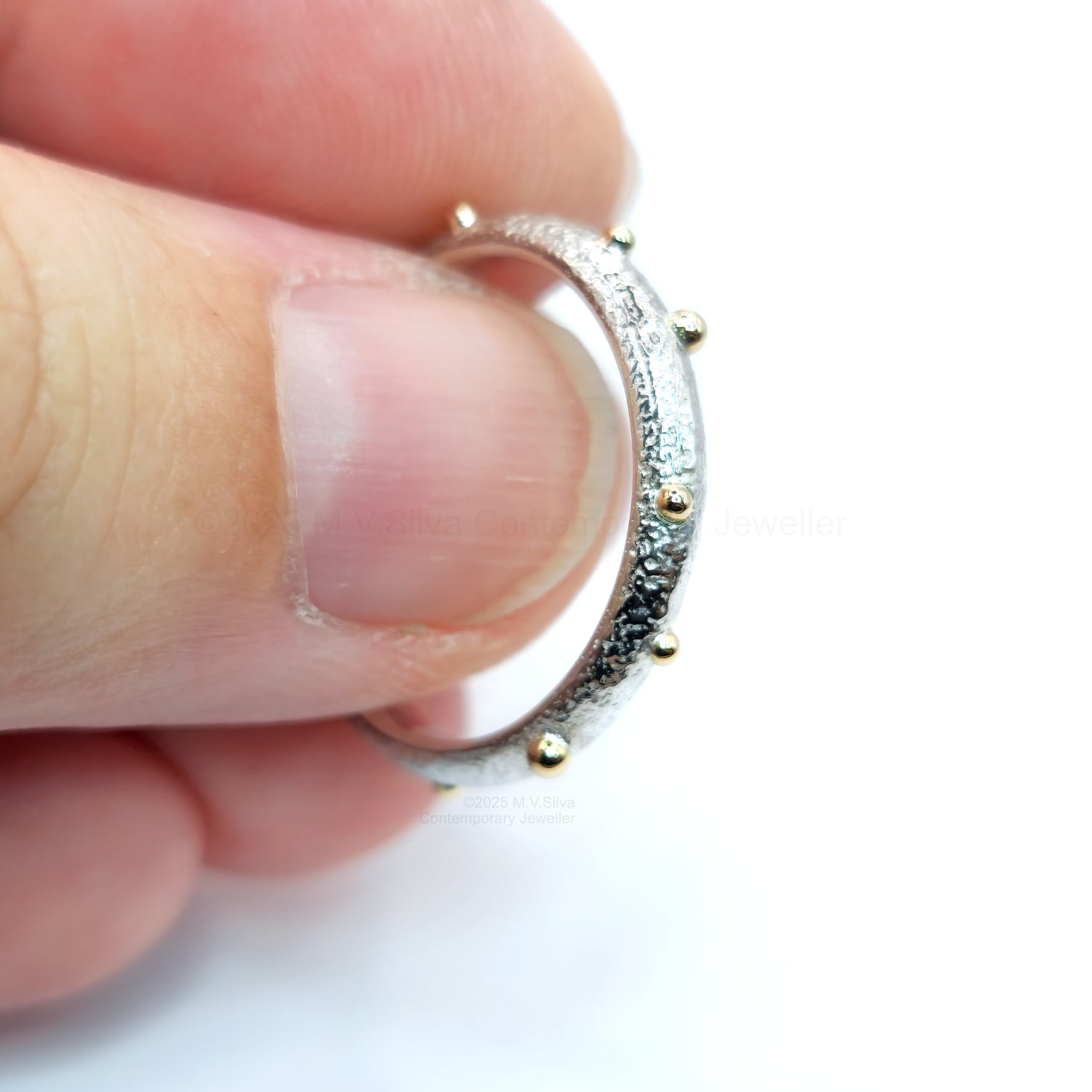 "Satellites" reticulated wedding ring with gold accents
