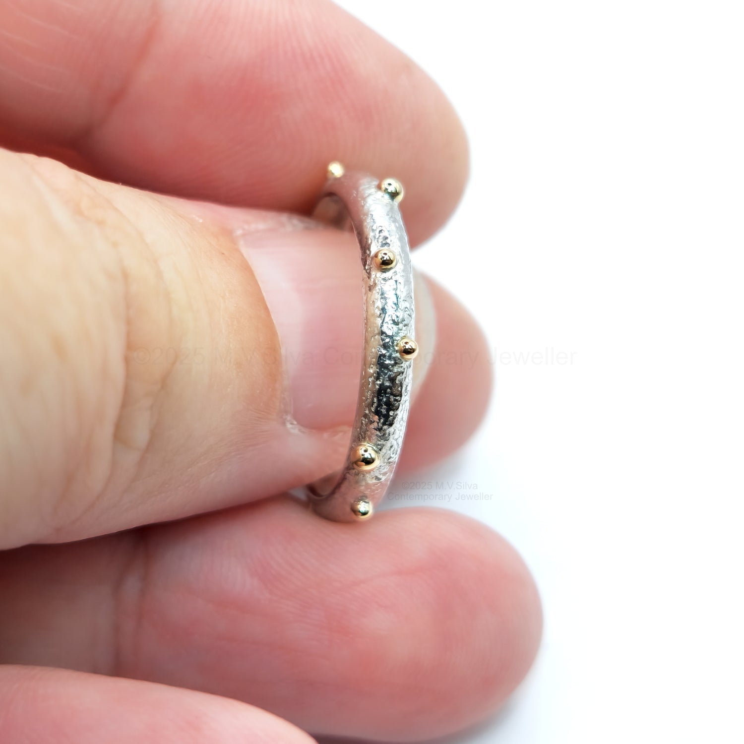 "Satellites" reticulated wedding ring with gold accents