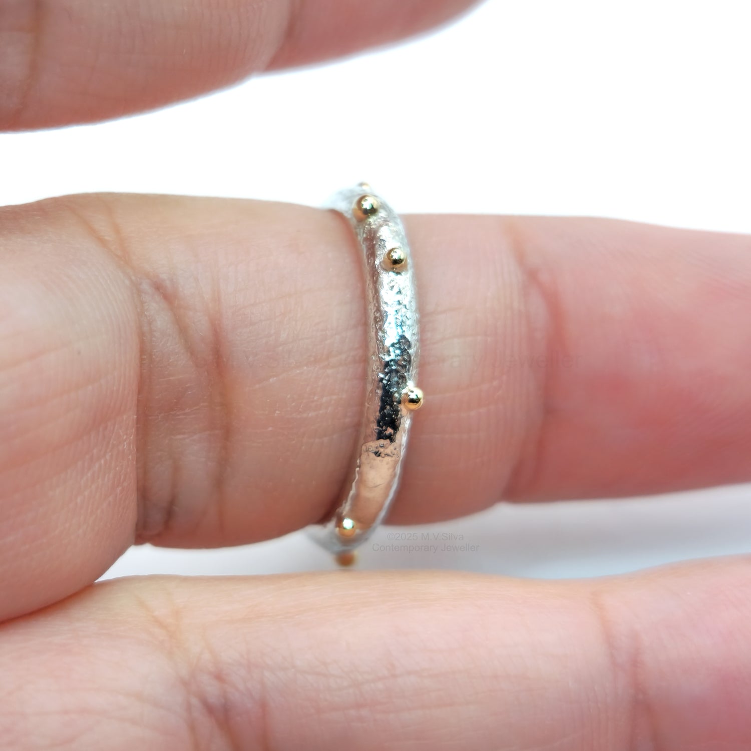 "Satellites" reticulated wedding ring with gold accents