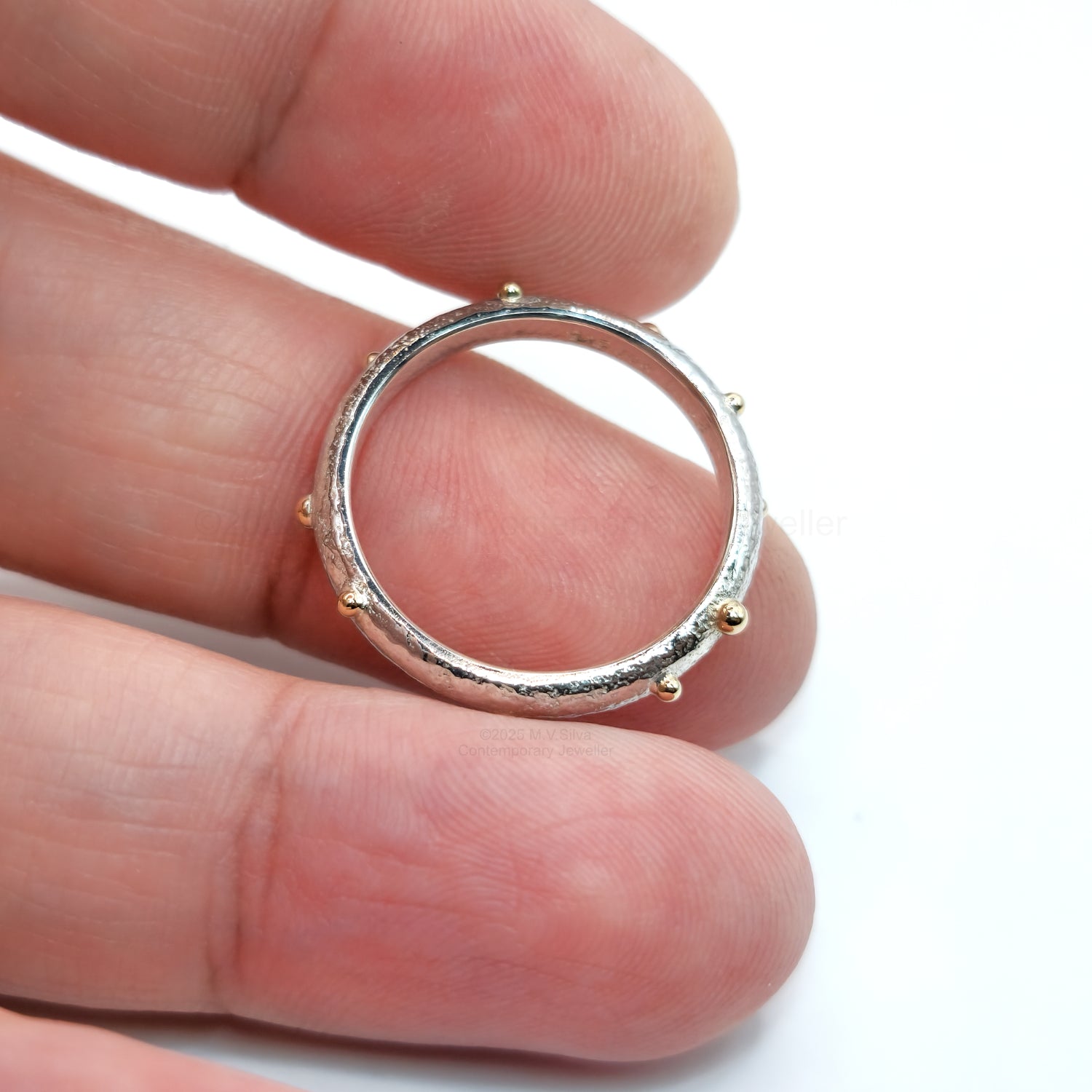 "Satellites" reticulated ring with gold accents