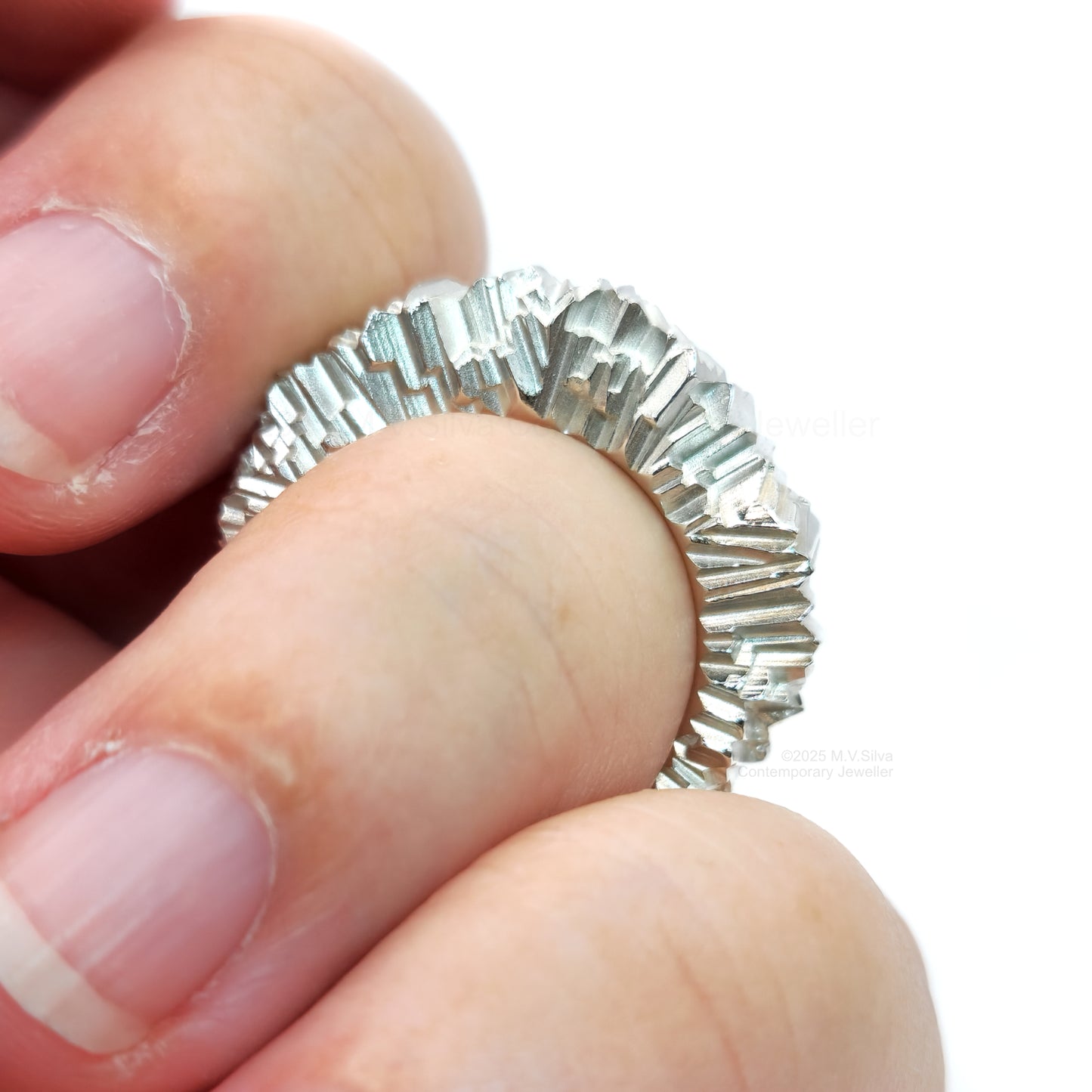 Sunray sterling silver statement ring on finger
