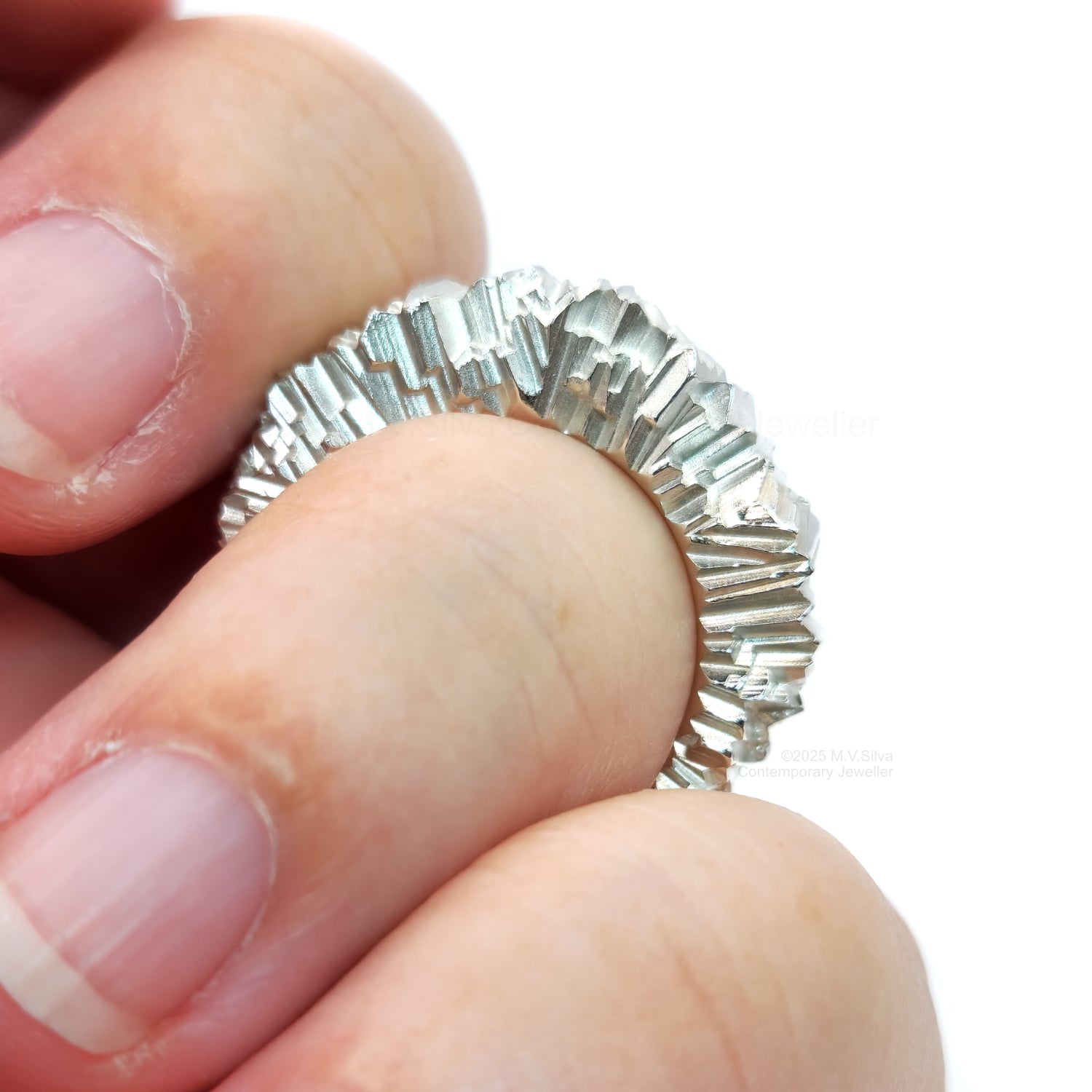 Sunray sterling silver statement ring on finger